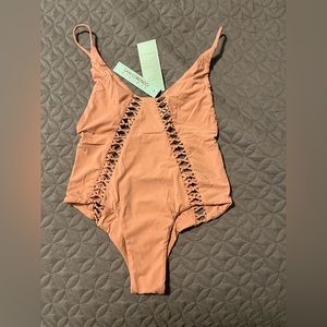 This is a peachy pink San Lorenzo one peice bathing suit